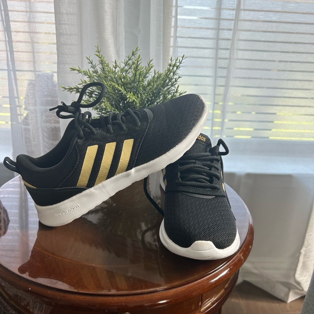 Adidas women black and gold running shoes